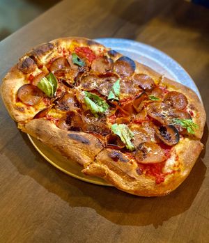 The Heathen pan pizza w/ the amazing BeHive pepperoni✨  at Donna Jean in San Diego