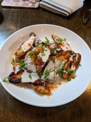 Roasted potatoes with truffle cream at Donna Jean in San Diego