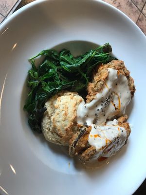 Chicken-fried shrooms with biscuit, gravy and greens. 1000% delicious!  at Donna Jean in San Diego