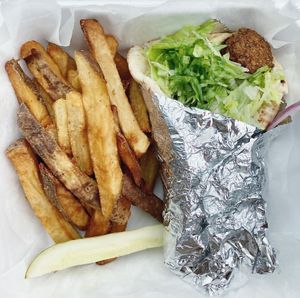 the vegan falafel pita plate 🥙   at Via Roma in North Conway