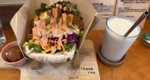 From left to right: Salt Donut, Falafel Pita L, Banana Juice at Gold Falafel in Osaka
