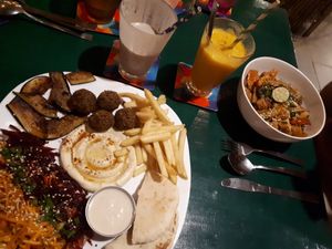 The platter, the tofu stirfry; the peanut butter cup and the mad mango - all so good! at Little World in Palolem