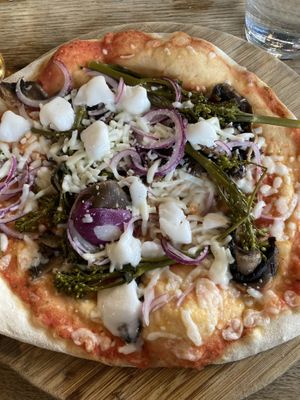 Pizza with vegan feta & veg. Personally not a fan of the broccoli   at The Stable in Newquay