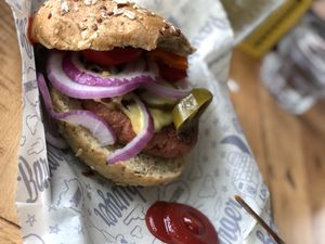 Beyond burger with Vegan American on a Sprout Bun at Bareburger in Rye