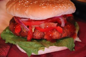 NEW VEG BURGER CASERO:
Chickpea burger with fennel, lettuce, fresh tomato, mixed vegetable on plate (onion, peppers and zucchini), homemade vegan mayonnaise, Ketchup, served with fried chips. at Etiopico Afrika in Gran Canaria