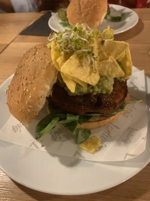 Sweet potato burger with guacamole, sweet onion, nachos   at Ludwig Burger in Salzburg