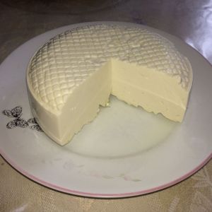 Almond Minas Cheese, a popular kind of brazilian cheese veganized using cultured almonds. We seel in pieces of 1/4 of the whole cheese. at Guia Vegano - Vegan Store in Florianopolis