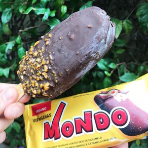 Mondo popsicle, vegan vanila icecream inside and chocolate outside with crunch caramel. Similar to the Magnum from Kibon. at Guia Vegano - Vegan Store in Florianopolis