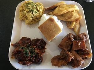 BBQ platter with yams, Mac and cheese, plantains, cornbread and rice  at Soul Good Vegan Cafe in Durham