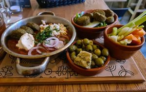 Szakszuka, falafels, olives and veggie sticks at Tel Aviv Urban Food - Mickiewicza in Warsaw