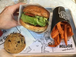 The Guac Burger, Air Baked Sweet Potato Fries and the gluten-free chocolate chip cookie! at By Chloe - Seaport Blvd in Boston