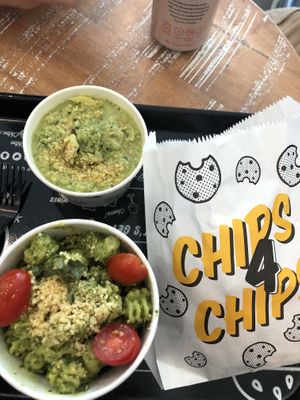 Pesto pasta and kale/artichoke dip at By Chloe - Seaport Blvd in Boston