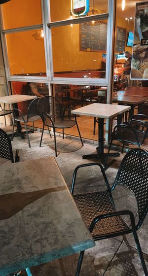 outside and inside seating   at Taco Rico in Doral