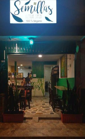 Exterior at night at Semillas Comida Sana in Pereira