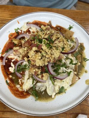 Chilaquiles Divorciadas con tofu revuelto y vacon  at Vegana Del Norte in Hermosillo