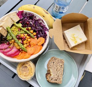 Banana, water, bbq tofu poke bowl with banana bread and “cheese”-cake    at apeti in Paris