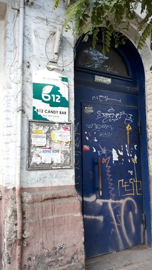 B12 can be a bit tricky to find, This is the entrance door at Mezhygirska 24. When you are inside you walk down to the basement to get to B12. at B12 Candy Bar - Maybe closed in Kyiv