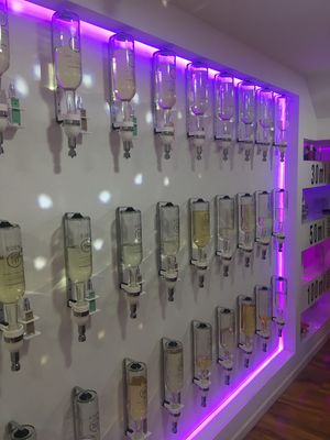 Walls filled with perfumes  at Eden Perfumes - The Lanes in Brighton