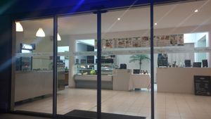 Photo of the entrance from the outdoor seating area at Vega'Sun in Golfe-juan