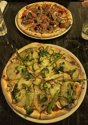 Pizza Vegetariana #53. (top) and Vegetariana 2 #54.(bottom) both with vegan cheese and extra broccoli in the case of the latter.  at Fratelli Pizzeria in Aarhus