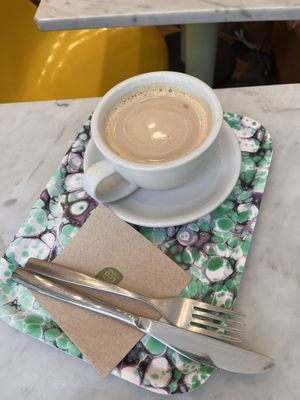 Latte   at Maisie Cafe in Paris