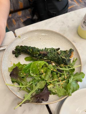 Half the tart (the other half is cut on my partner's plate) at Maisie Cafe in Paris