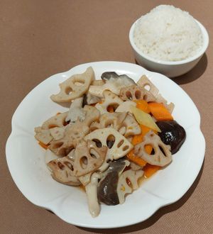 Stir Fried Lotus Roots and Assorted Mushrooms with Pumpkin 南瓜炒藕片什菌 at Lotus Veggie 蓮花健康素食 - Jordan in Kowloon