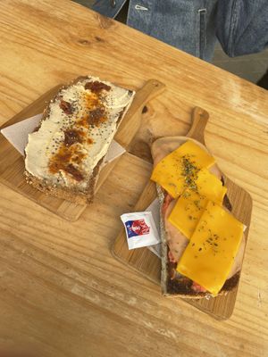 toasts hummus/dried tomato and tomato/vegan cheese/vegan mortadella (1.8€ each)  at Mimimi in Granada