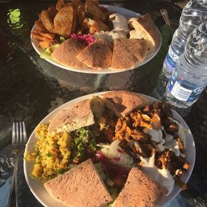 Assiette Hummus Végé Shishtaouk et assiette Hummus Falafel at Falafel St. Jacques in Montreal