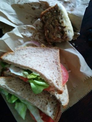 hummus sandwich and piece of cake at The V & V Cafe in Glasgow