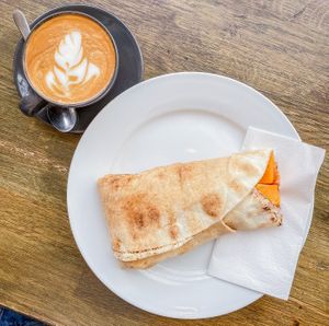 coconut flat white + moroccan butternut flatbread at The V & V Cafe in Glasgow
