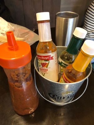 Amazing selection of hot sauces including a homemade salsa at Que Pasa in Kyoto