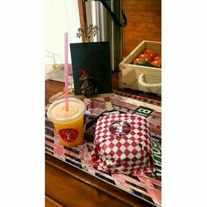 Veggie burger and natural juice at Wadaka Bites in Bogota