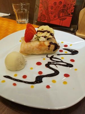 Crepe stuffed with chocolate sponge cake strawberry cream, strawberries and bananas with ice cream! at hal cafe 229 in Kamakura