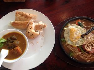 Curry to the left with very tasty mok meat (maybe jack fruit) right is mixedveg at Yuan Sheng Vegetable Restaurant in Siem Reap