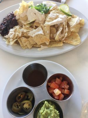 Why Not Chos (toppings on the side for kids) ($14.00) at Vegan Hills in Honolulu