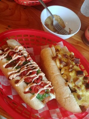 Specials. Mimis Summer dog on left, can't remember name of the one on the left, but is "bacon" and mac n cheeze😍 at Santoro's Franks & Chili in Bethlehem