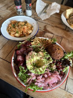 Winter grain bowl with a cauliflower fritter and vegan kimchi   at The Canteen  in Provincetown