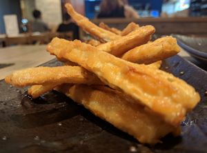 Fried burdock sticks. Kinda like parsnip, but harder and not as sweet. at LBK Craft in Nara