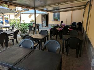 Outdoor seating area  at Cardamomo Cucina Vegana in Arona