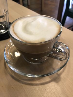 Lots of froth cappuccino  at Cardamomo Cucina Vegana in Arona