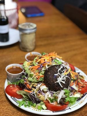 Full Phoenix Salad, dressing (red pepper) on the side. A fiesta of flavors. Fantastic! at Blue Phoenix Cafe in Lexington