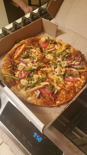 Achari Veg pizza made vegan at Pizzawala's in Canton