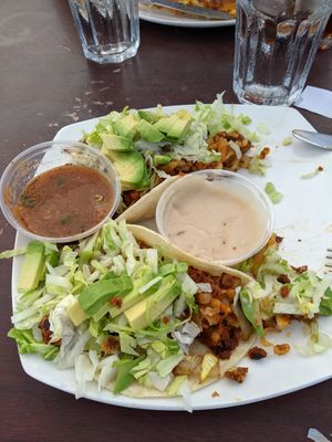 Raul's tacos (I already ate one) at Aunt Yese's Home Cooking in Garden Grove