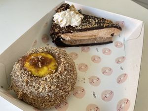 Rhubarb & custard donut and Ferrero Rocher cake 💥 at Nutie Donuts in Balmain