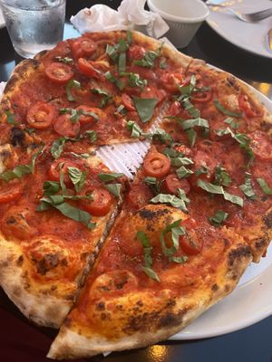 I took a bite from this. The marinara pizza.  at Stoked Wood Fired Pizza in Brookline