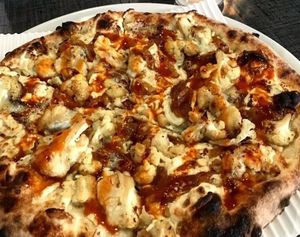 vegan buffalo cauliflower pizza at Stoked Wood Fired Pizza in Brookline