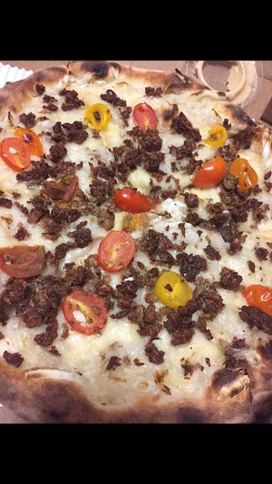 Cheese burger pizza  at Stoked Wood Fired Pizza in Brookline