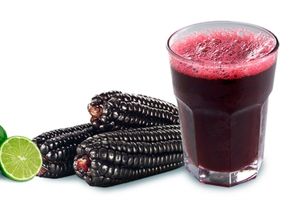 Chicha Morada, "Sweet, cool, purple fruit juice made from purple corn! Indigenous to the Inca Natives of Peru in South America, it has a yummy, refreshing flavor. iNon-alcoholic, it is a type of chicha usually made by boiling the corn with pineapple skin, cinnamon, clove, and sugar. at Sabor Peruano in Santa Fe