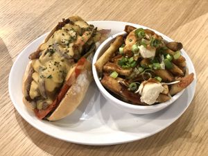Philly cheesesteak and side of poutine   at The Very Good Butchers in Victoria